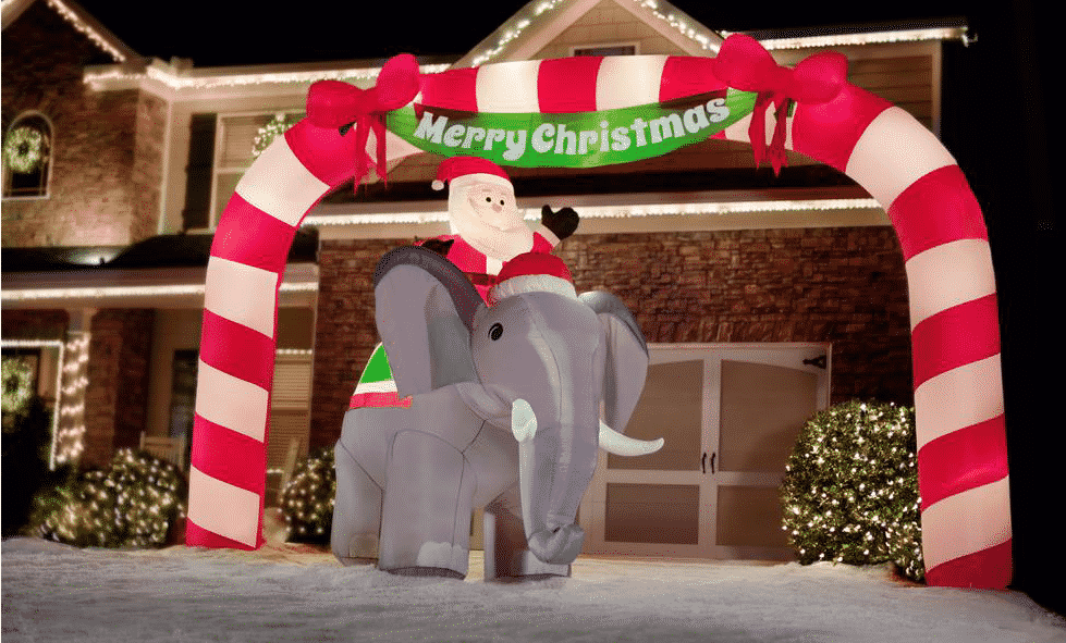 elefantes vestidos de Santa Claus repartiendo regalos